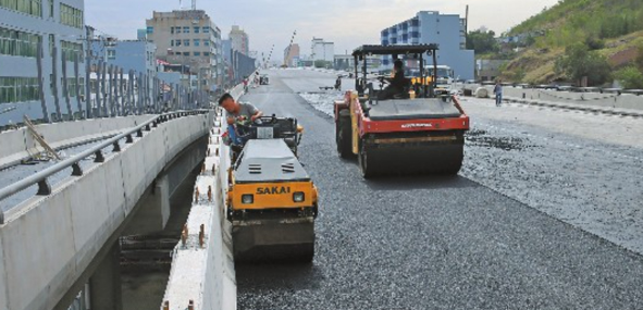 公路桥梁沥青路面接缝施工技术探讨